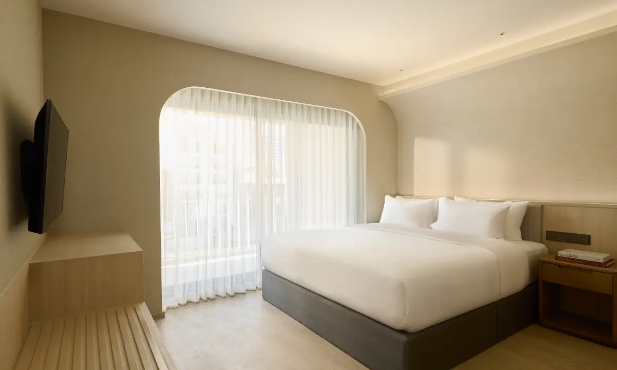 Skyview Suite bedroom with a scenic balcony